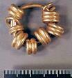 A set of Bronze Age gold rings threaded onto one large gold ring found in Gresham  © Norfolk Museums & Archaeology Service