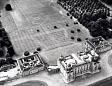 Houghton Hall and surrounding park. Parchmarks of the former garden lay out can be clearly seen behind the hall  © Norfolk Museums & Archaeology Service
