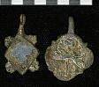 A medieval horse harness pendant from Cawston depicting a hunting dog running past a tree with a partridge type bird sitting in the branches.  © Norfolk Museums & Archaeology Service
