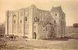 19th century photograph of Castle Rising Castle. Note the man in the top hat!  © Norfolk County Council