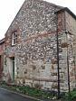The surviving wall of a medieval chapel incorporated into a later house in Castle Acre  © Norfolk Museums & Archaeology Service