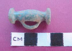 Photograph of an Iron Age toggle.