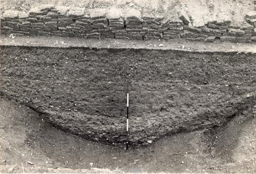 A photograph of a section through the inner ditch of Arminghall Henge taken during the excavations of 1935.