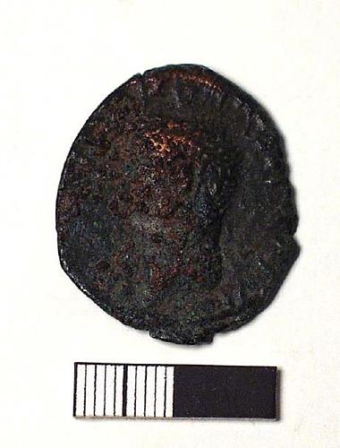 The obverse of a Roman as coin from the site of a Roman temple in Caistor St Edmund.