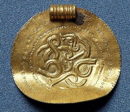 An Early Saxon gold bracteate from the site of 'Blakeney Chapel'