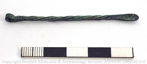 An Early Saxon ear scoop from the Early Saxon cemetery at Castle Acre.