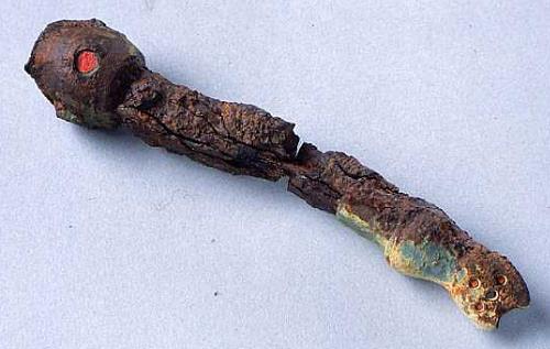 Photograph of an Iron Age iron and copper alloy linch pin from Saham Toney. Photograph from MODES.