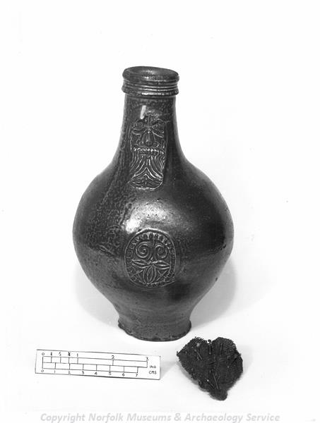 Photograph of a witch bottle found in 1905 at 14 King Street, King's Lynn.
