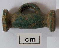 Photograph of an Iron Age copper alloy toggle from North Repps.