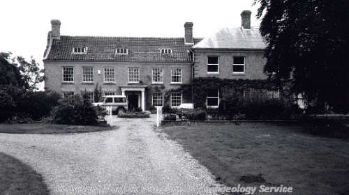 The early 18th century facade of the Old Hall with a Doric pillared facade.