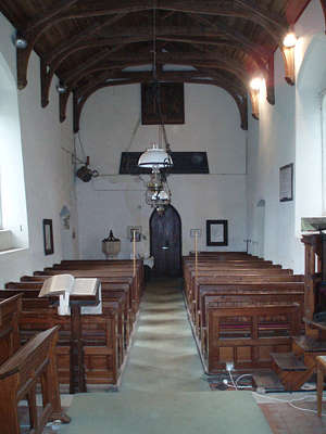 The interior of St Andrew's Church, East Lexham, looking from the chancel into the nave